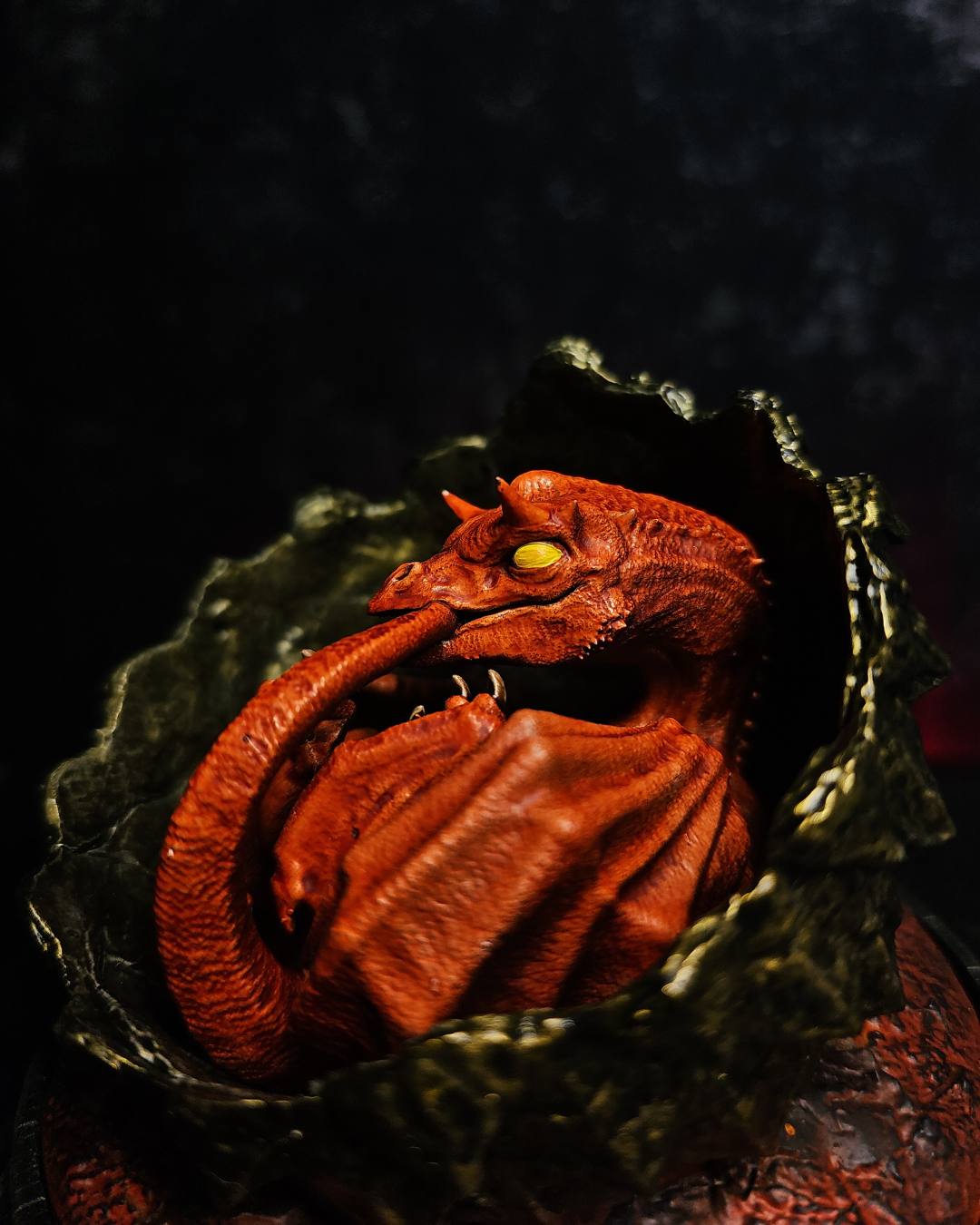 Handmade resin baby Caraxes dragon curled inside a dark fantasy dragon egg inspired by House of the Dragon season 3