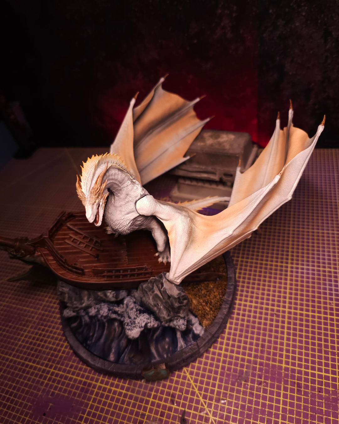 Dynamic Seasmoke dragon figurine displayed above a Velaryon ship with detailed ocean base and fantasy-inspired scenery.