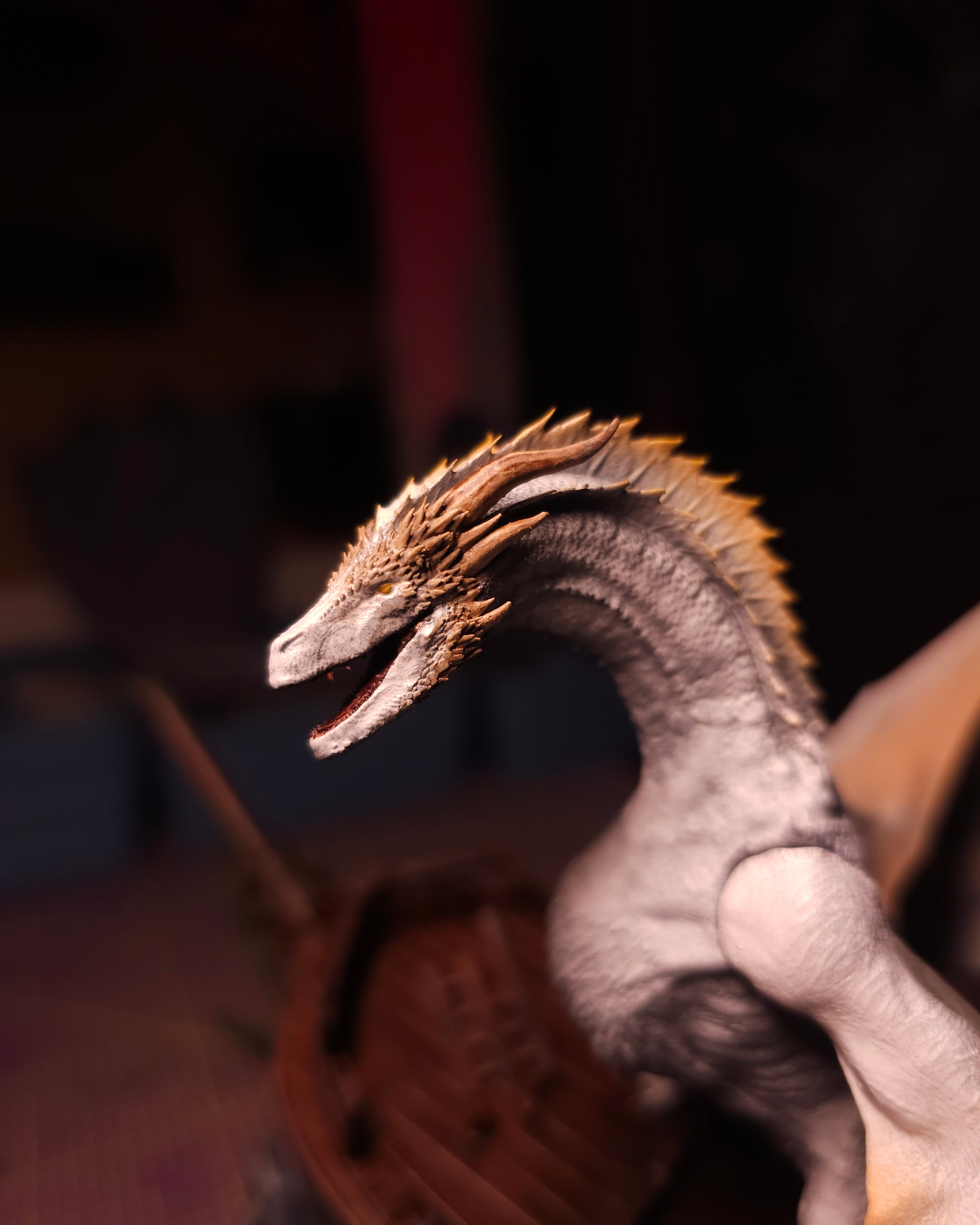 Seasmoke dragon resin figurine overlooking a damaged ship at sea, inspired by House of the Dragon and Addam of Hull lore.