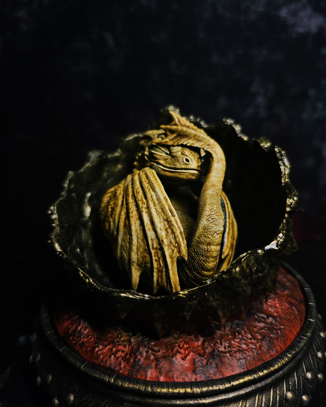 Discover a baby dragon hatchling inspired by Syrax House of the Dragon. Hand-painted resin figurine with detailed dragon egg and fantasy base.